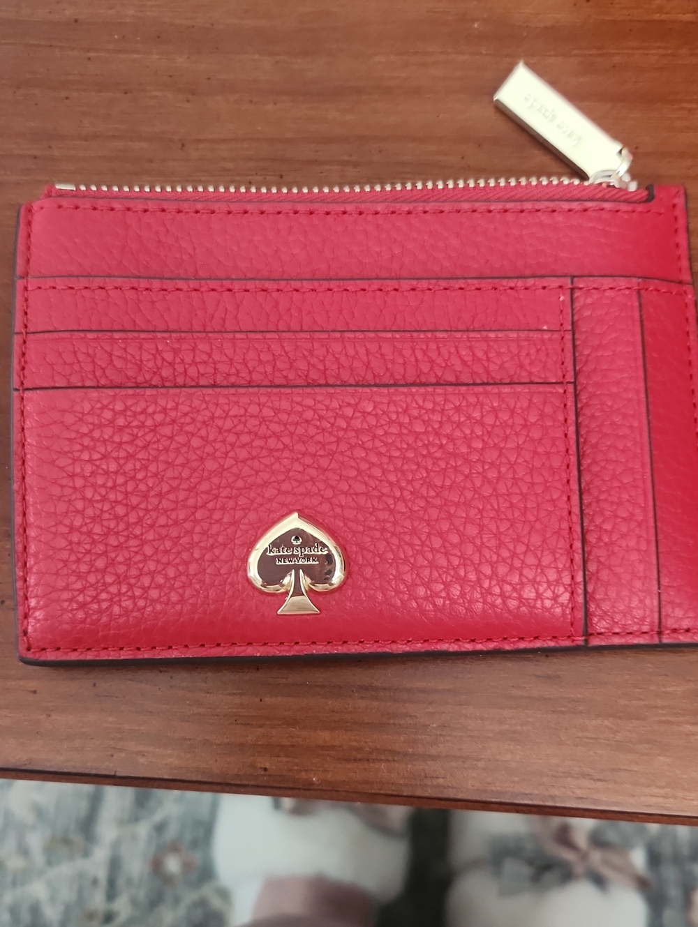 kate spade red pebbled leather slim card case with gold spade